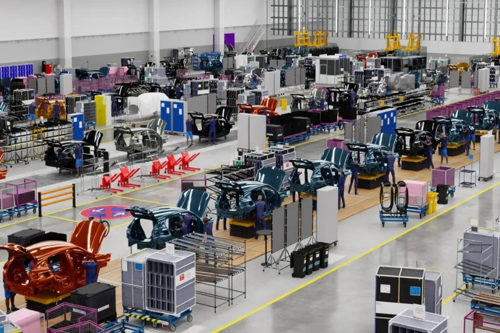 Vista panorâmica de uma fábrica automotiva moderna e limpa, com diversos chassis de carros em diferentes estágios de montagem em uma linha de produção complexa. O ambiente sugere um sistema de Digital Twins sendo usado para monitoramento e otimização em tempo real, representando a Indústria 4.0.
